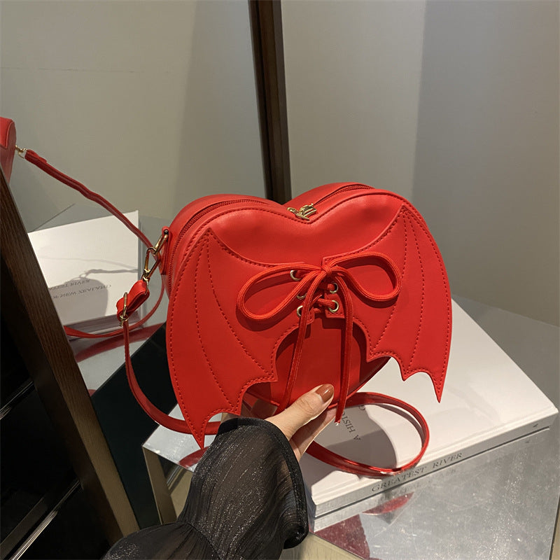Heart Shape Bag With Bat Wings