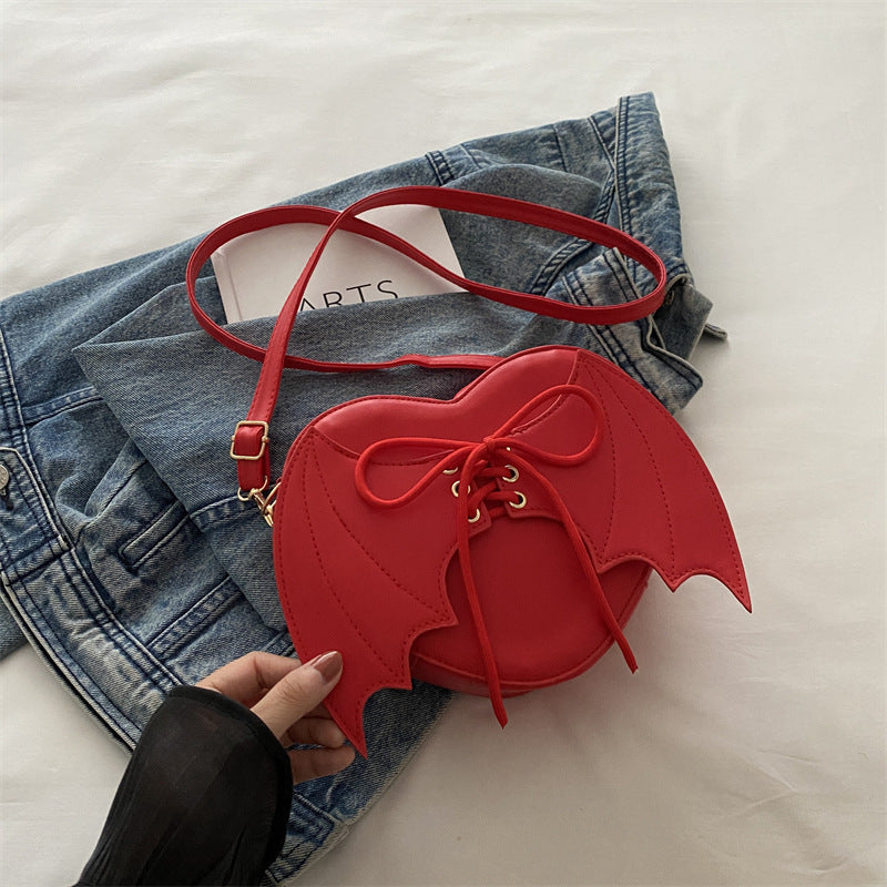 Heart Shape Bag With Bat Wings